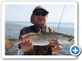 This trout is headed for the ice chest