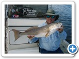 Captain Chuck Fultz and his really nice red fish